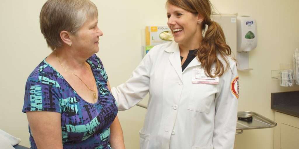nurse-smiling-with-patient