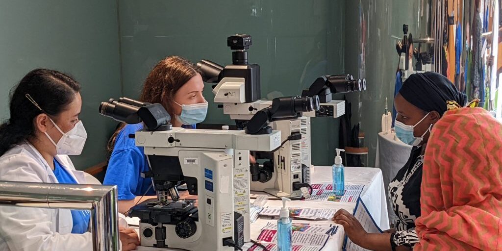 Patients at Montefiore See, Test and Treat program learn about the role of a pathologist. 