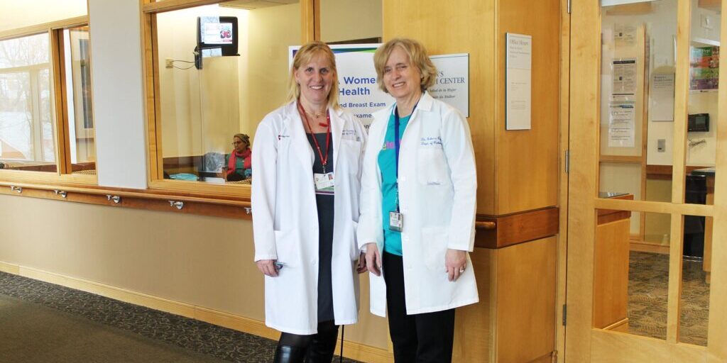Rebecca A. Osgood, MD, FCAP, at right, with Kate Harney, Cambridge Health Alliance chief of obstetrics and gynecology