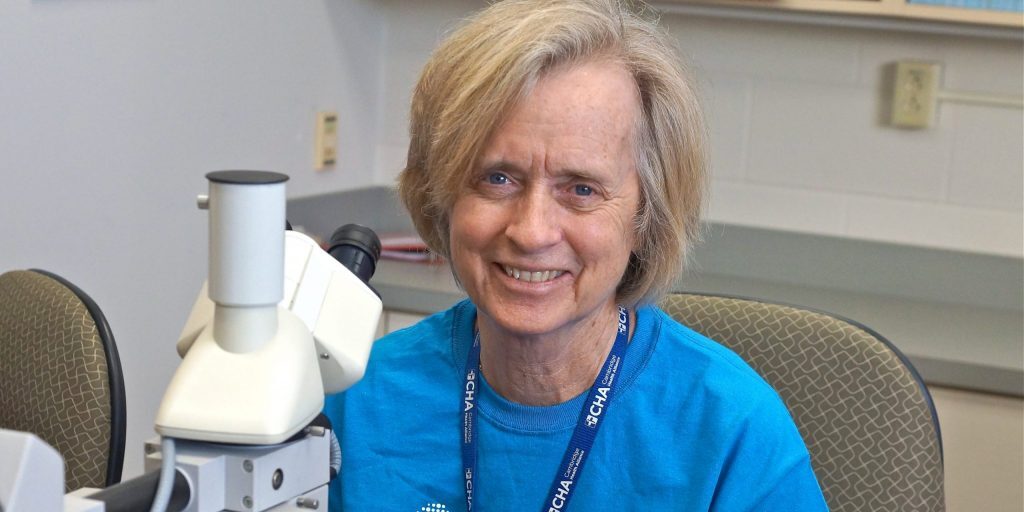 rebecca-osgood-microscope-cambridge-health-min