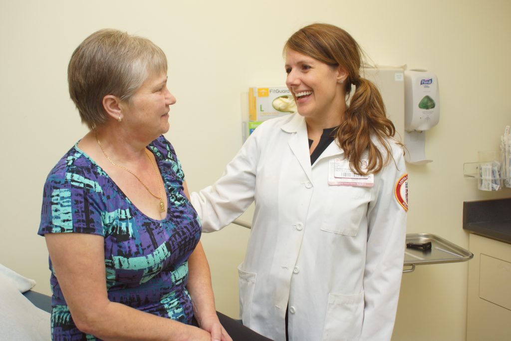 nurse-smiling-with-patient