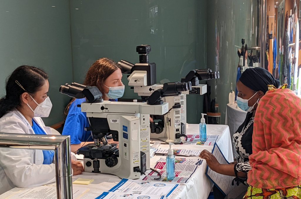 Patients at Montefiore See, Test and Treat program learn about the role of a pathologist. 